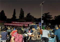 青岛崂山区:纳凉广场送农技 法律法规进社区